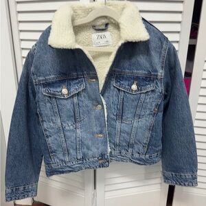 Button up denim kids jacket with fleeced lining.